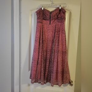 COPY - pink dress with black cheetah print. Strapless with a zipper in the bust.